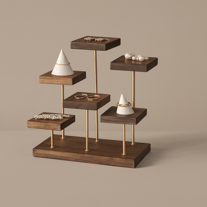 Wooden jewelry display stand with various items on a beige background