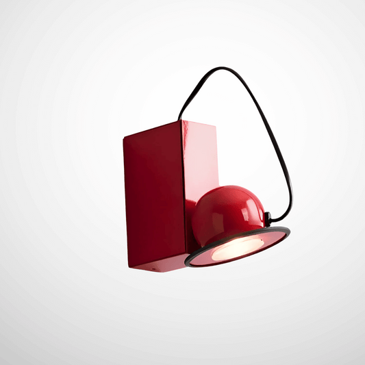 Red wall-mounted lamp with a white background