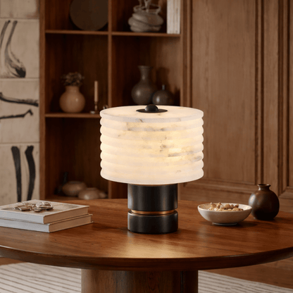 Table lamp on a wooden table with a warm and cozy atmosphere