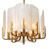 Chandelier with gold fixtures and white glass shades on a white background