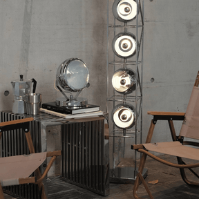Modern interior with a floor lamp and vintage-style furniture.