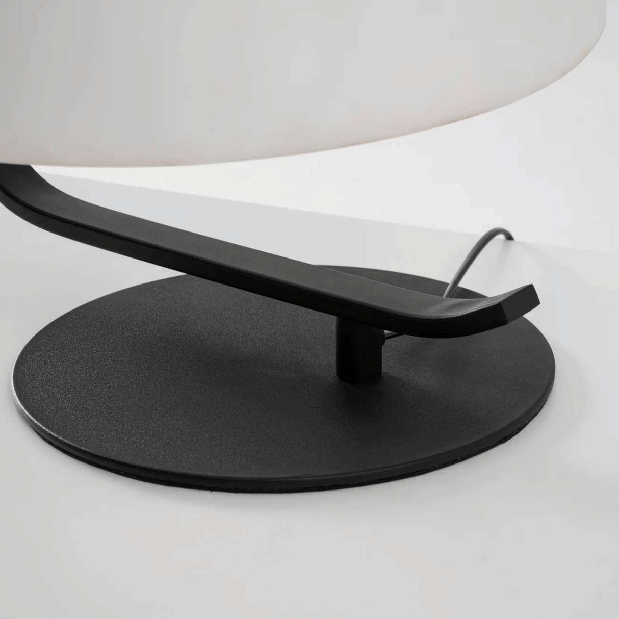 Black metal stand on a white background