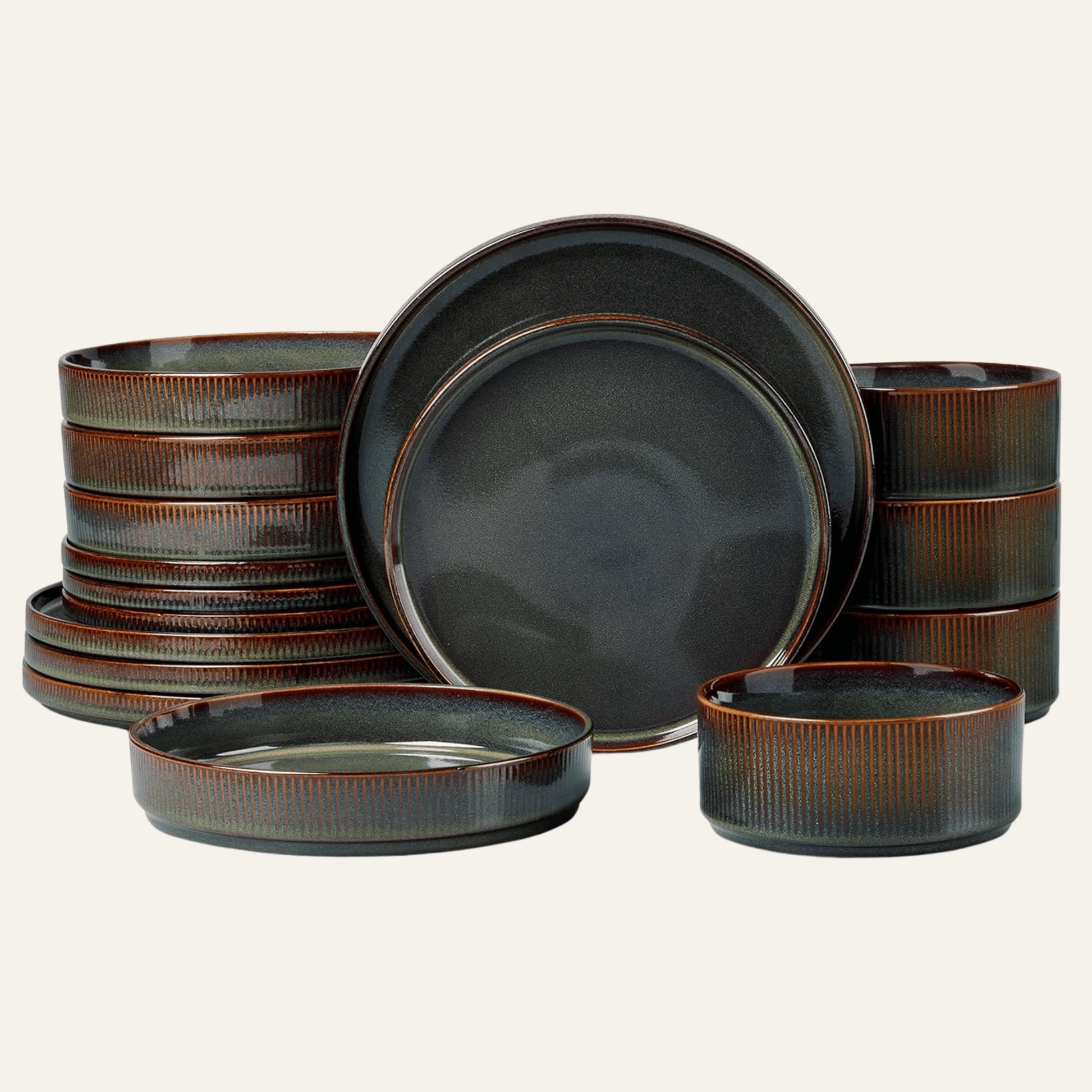 Set of ceramic plates and bowls with a brown and black glaze on a white background