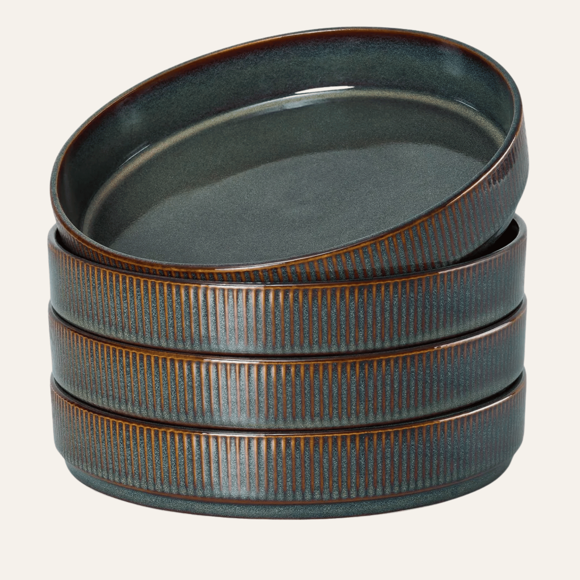 Set of three ceramic bowls with a textured surface on a white background