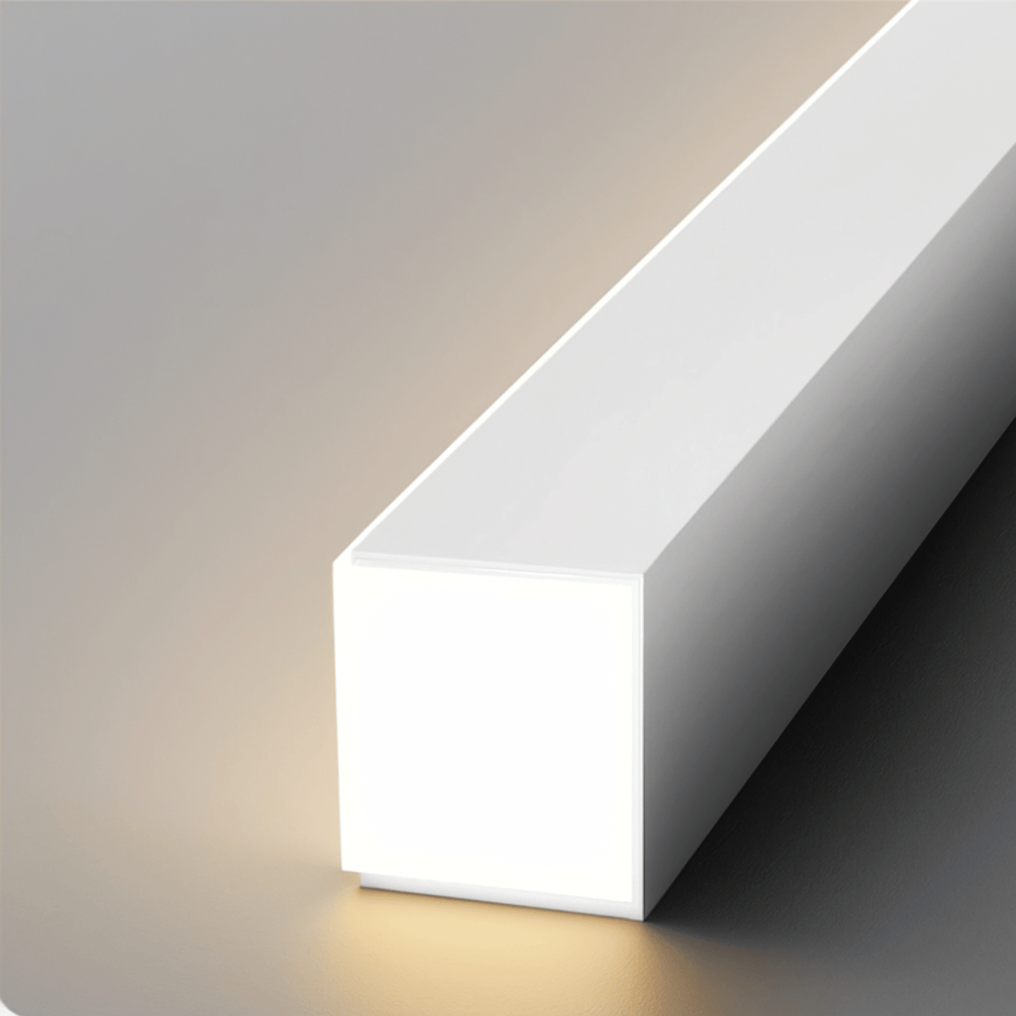 White rectangular light fixture casting a soft glow on a neutral background