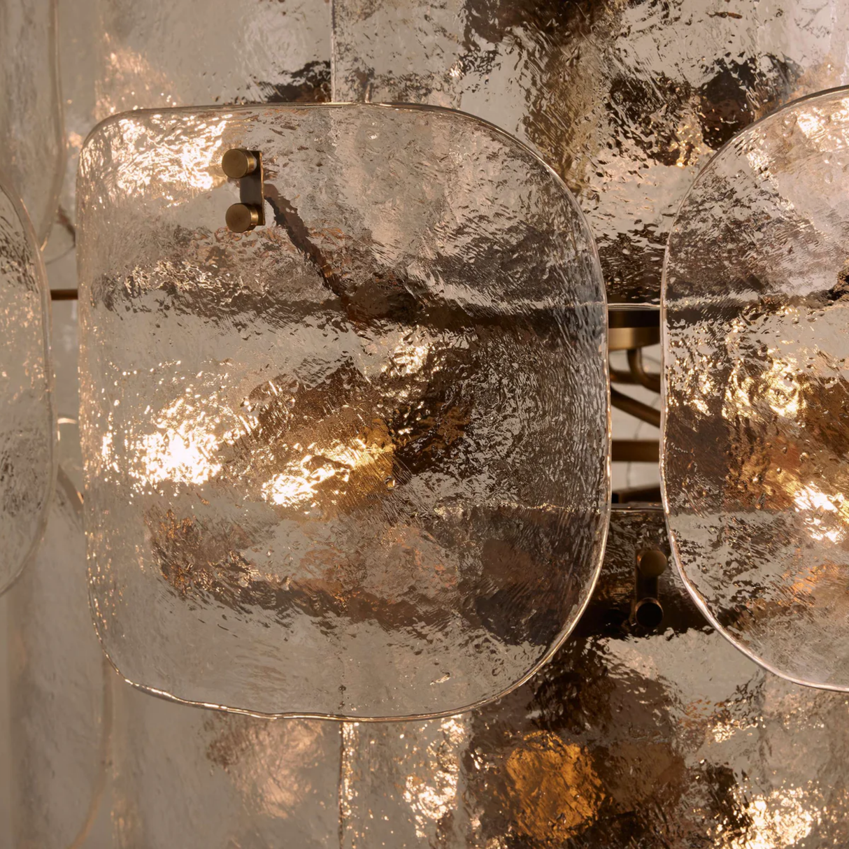 Decorative wall light fixture with metallic finish