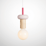 Minimalist pendant light with wooden and pink design on a white background