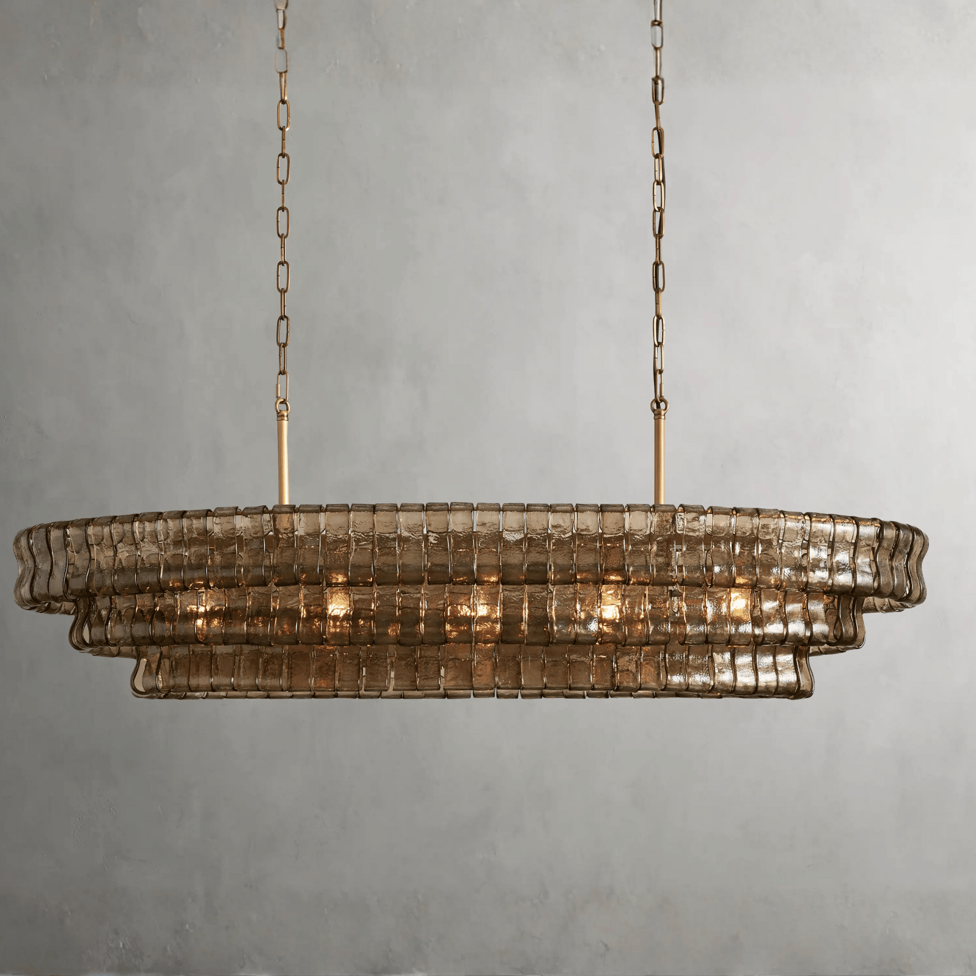 Decorative chandelier with glass panels on a gray background