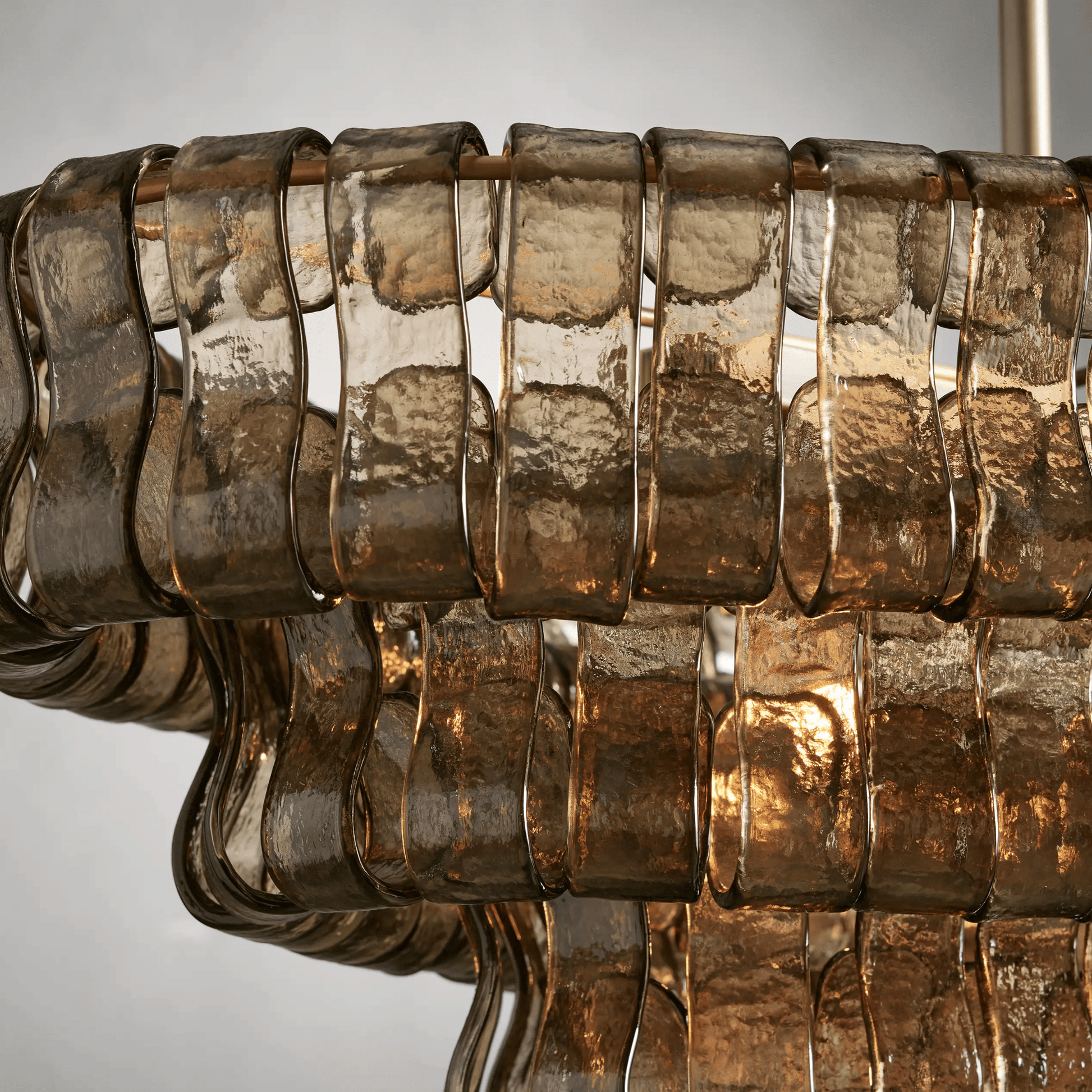 Close-up of a textured metal surface with a neutral background