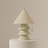 Decorative lamp with a geometric design on a beige background
