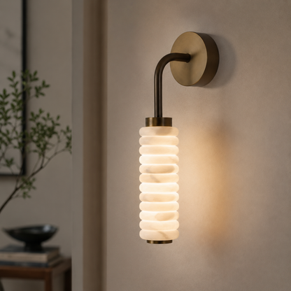 Wall-mounted lamp with ribbed design on a neutral wall