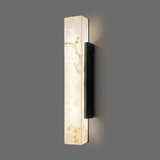 Wall-mounted light fixture with marble-like design on a gray background