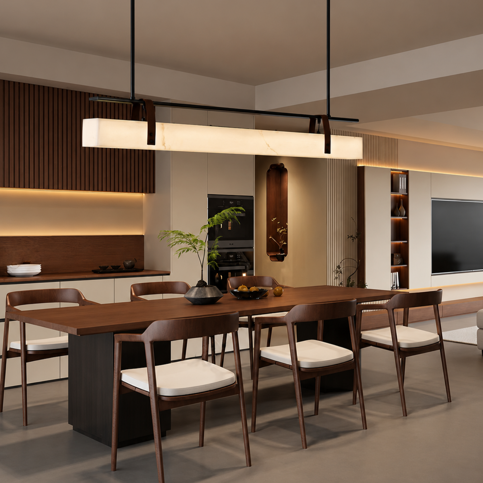 Modern dining room with wooden table and chairs, pendant light, and kitchen in the background.