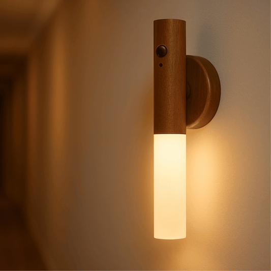 Wooden wall sconce with a warm glow on a beige wall