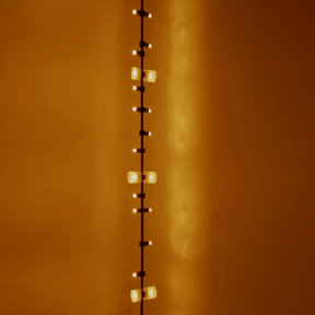 String of lights against a warm orange wall