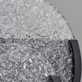 Close-up of textured glass surface with a gray background