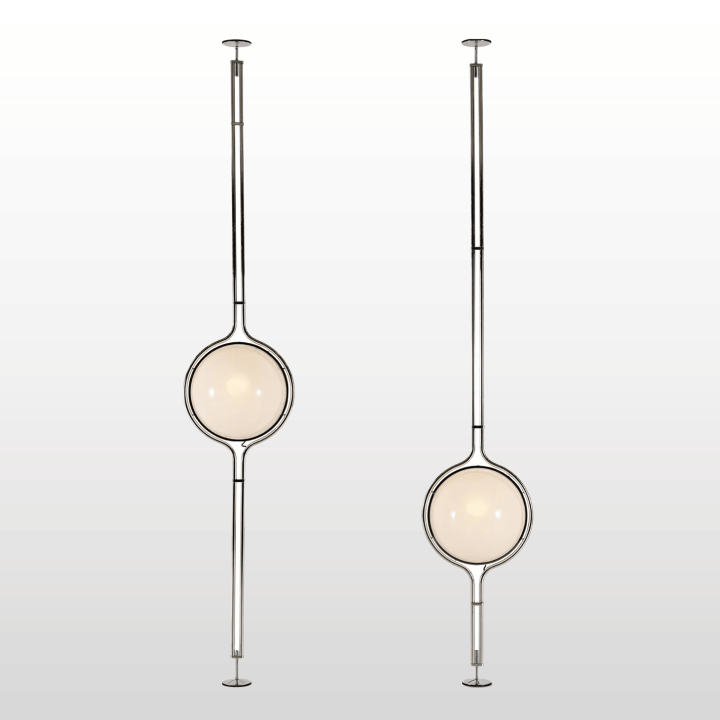 Two modern pendant lights with spherical glass shades on a light gray background