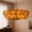 Velari Disc Orange Glass Chandelier — modern chandelier by Baskoraa