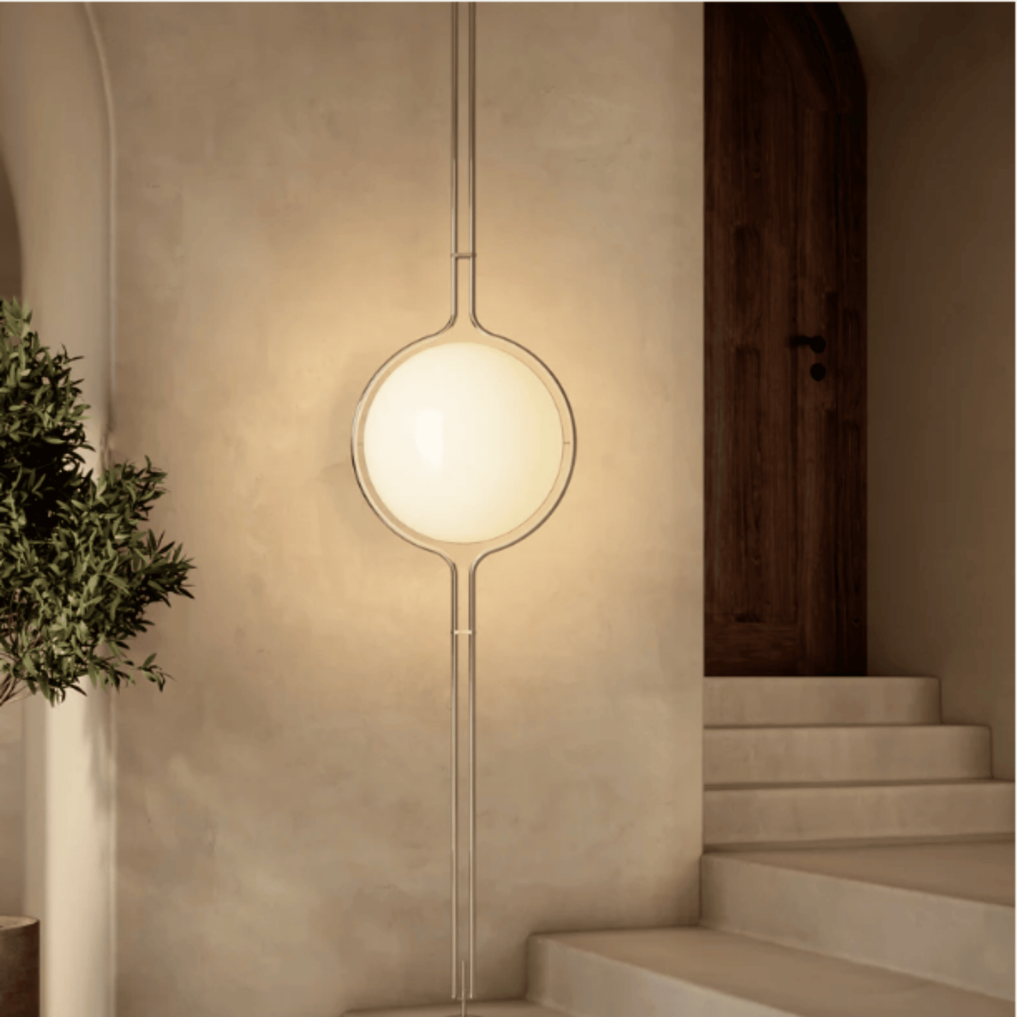 Modern pendant light fixture in a home interior setting with a neutral color palette.