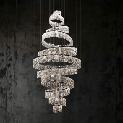 Decorative chandelier with spiral design on a dark background