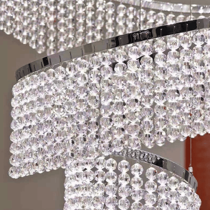 Close-up of a crystal chandelier with a blurred background
