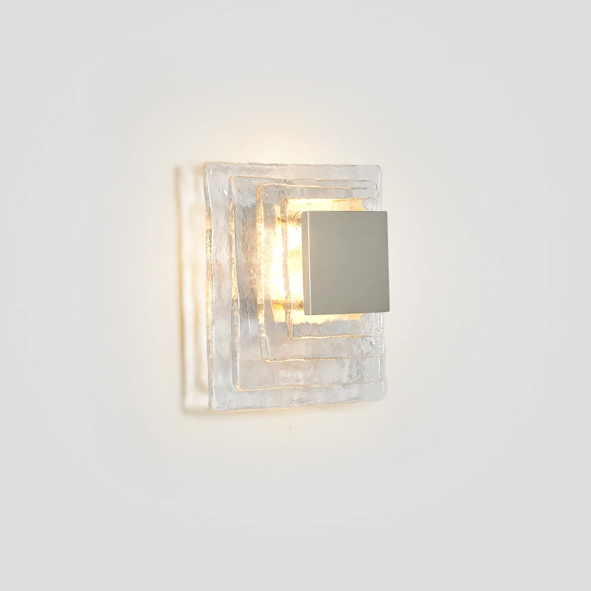 Square wall light fixture on a white wall