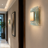 Modern wall sconce in a home interior setting