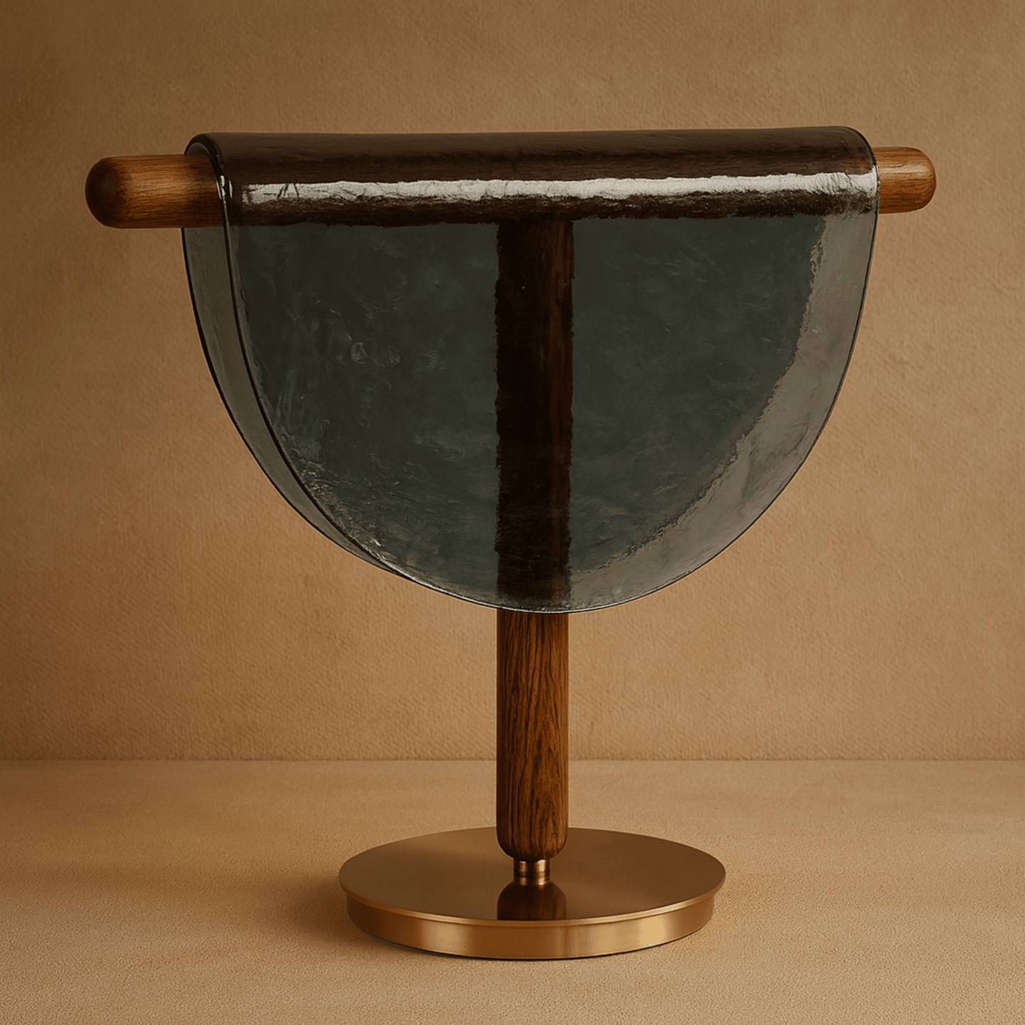 Decorative object with glass half-circle and wooden handle on a beige background
