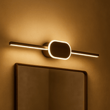 Modern wall light fixture on a beige wall with a mirror below.
