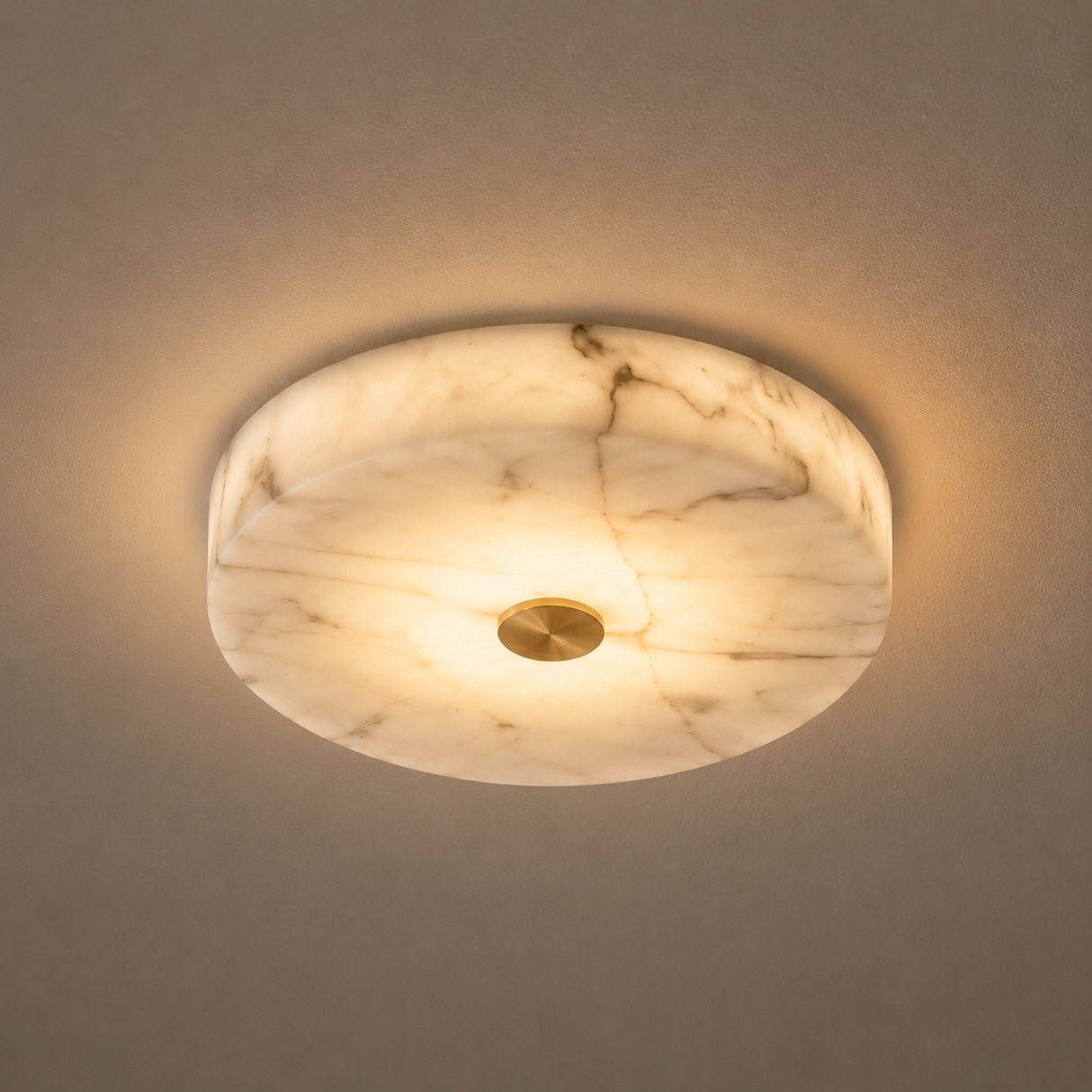 Round marble-patterned ceiling light fixture on a neutral background