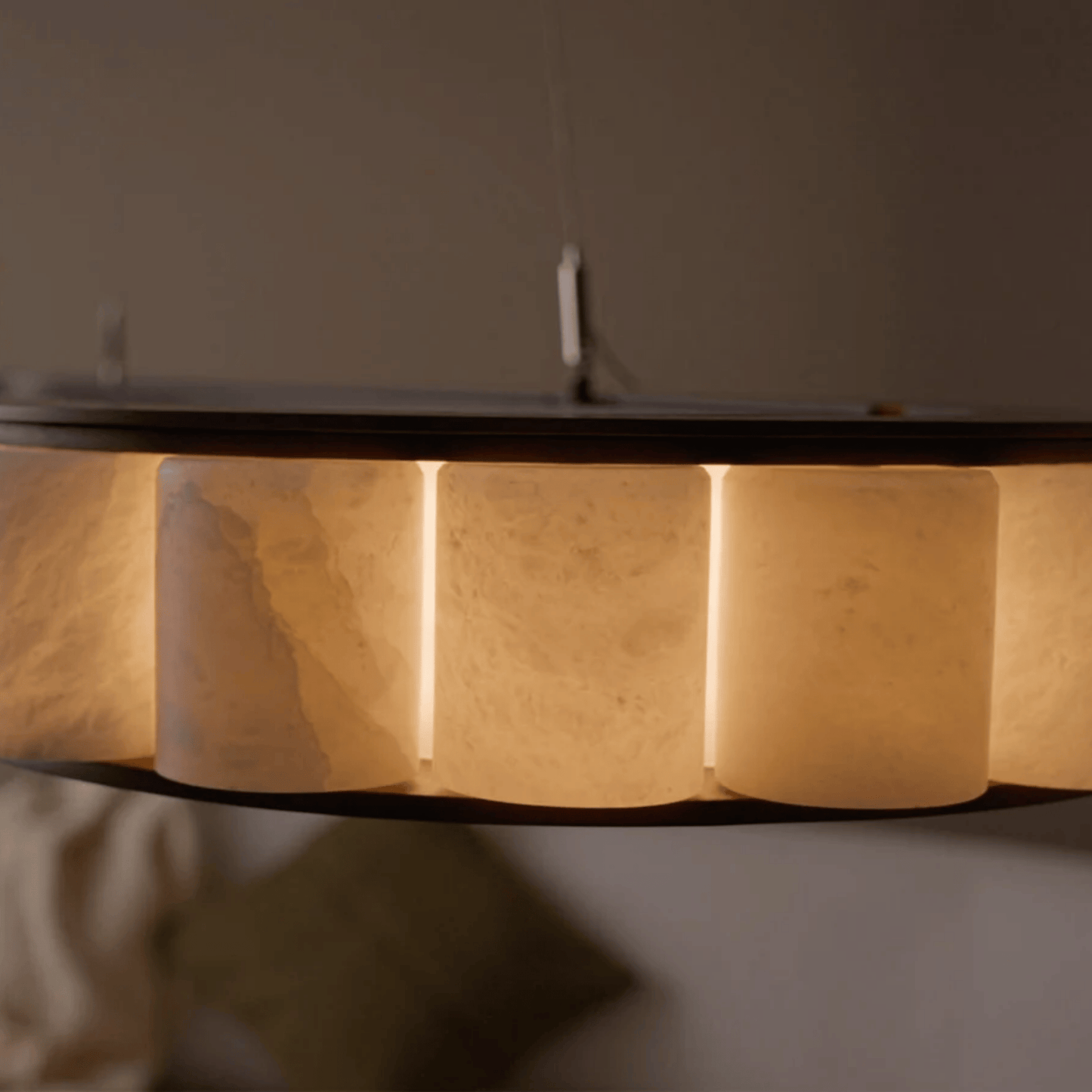 Round wooden table with a dark rim on a neutral background