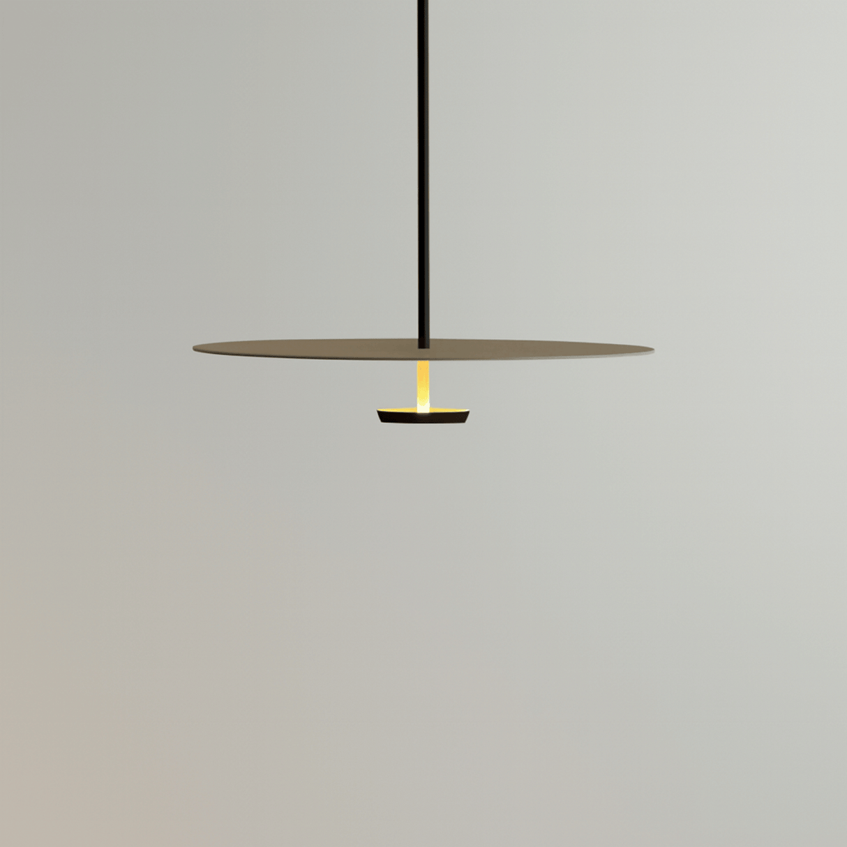 Modern pendant light with a minimalist design on a gray background