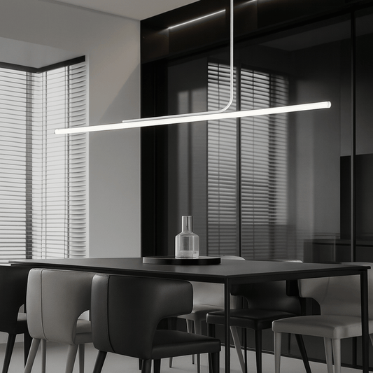 Modern dining room with a long linear pendant light fixture.