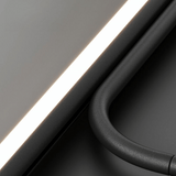Close-up of a car door handle and window mechanism on a dark background