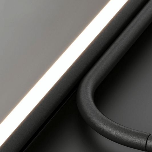 Close-up of a car door handle and window mechanism on a dark background