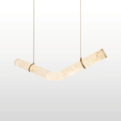 Modern pendant light with marble-like finish on a white background