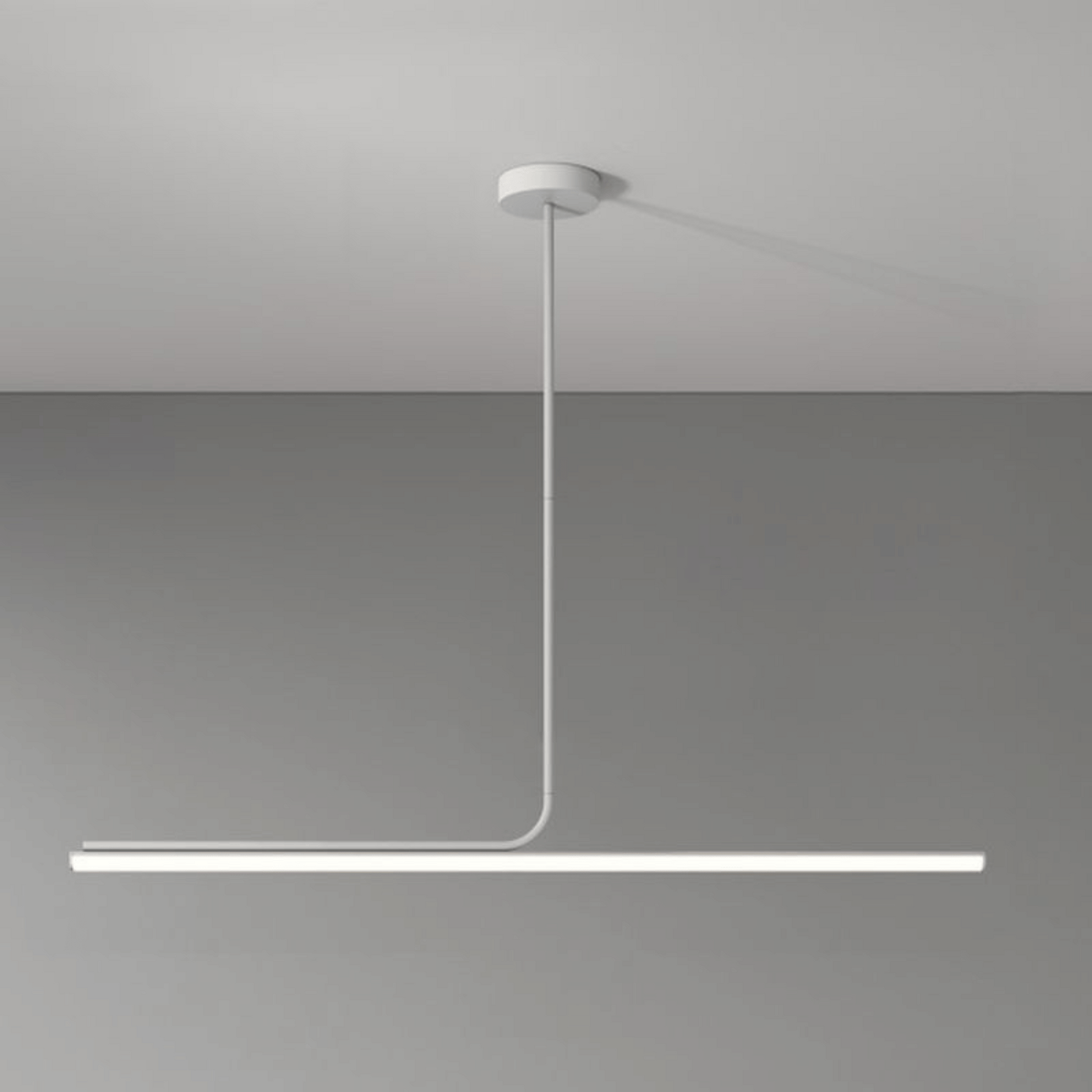 Modern pendant light fixture on a gray background
