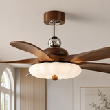 Wooden ceiling fan with light fixture in a room with a window and wall art.