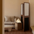 Room divider with geometric design in a living room setting