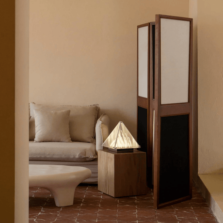 Room divider with geometric design in a living room setting