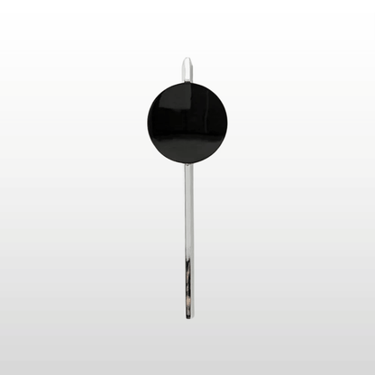 Black spoon with a round handle on a white background