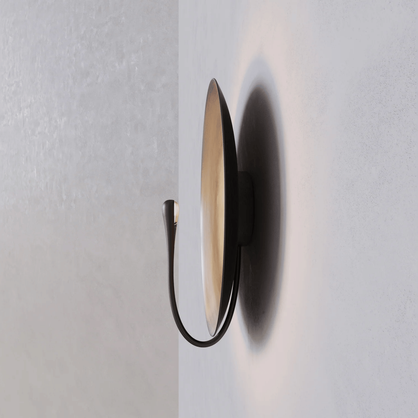 Modern wall light fixture on a plain wall