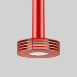 Red pendant light fixture on a gray background