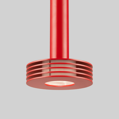 Red pendant light fixture on a gray background