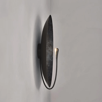 Modern wall light fixture on a plain white background