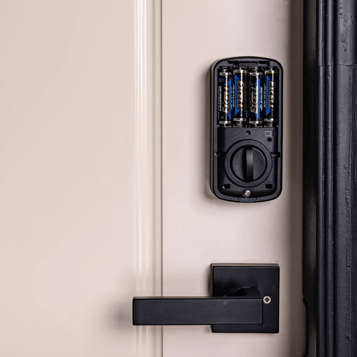 Smart lock device on a door with a handle