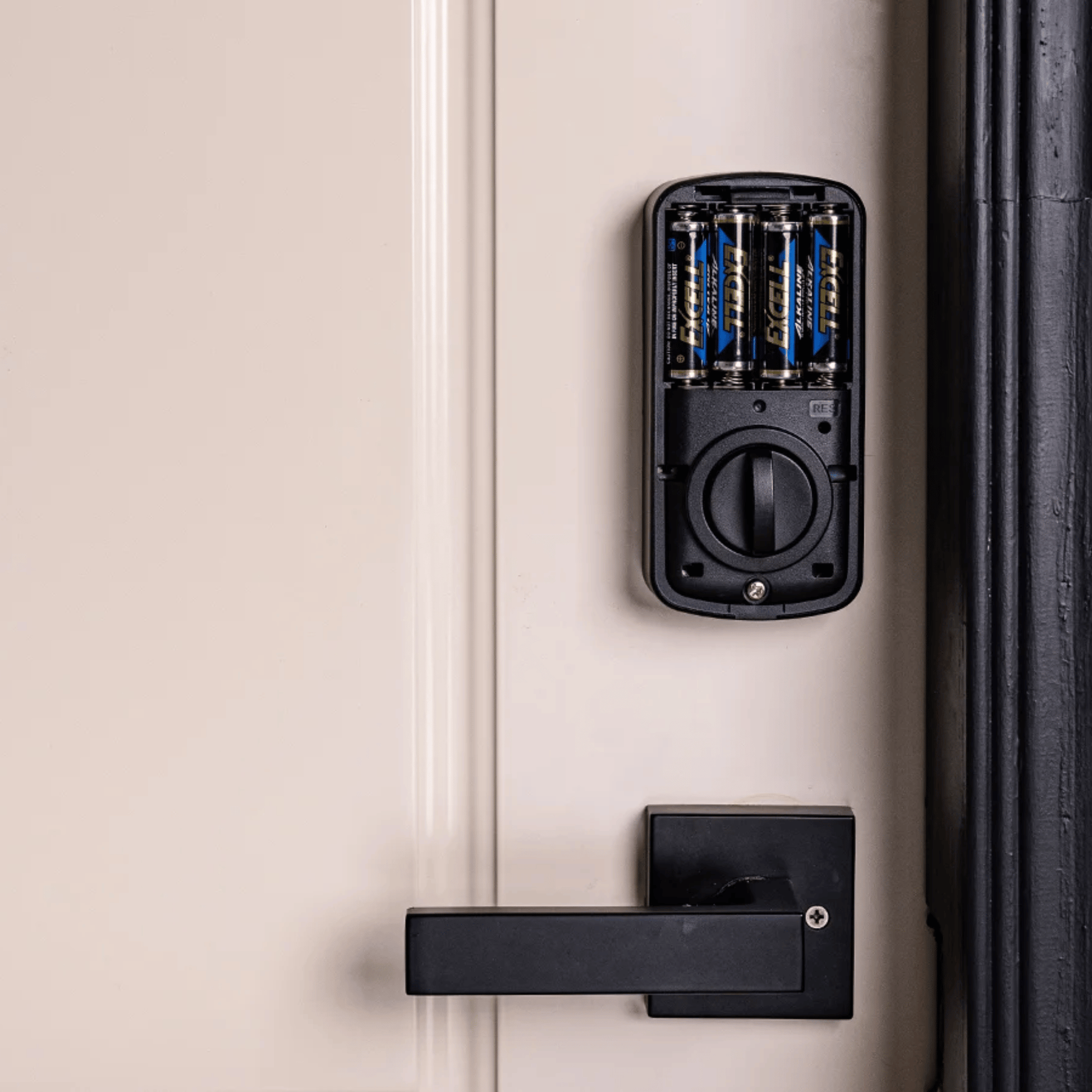 Smart lock device on a door with a handle
