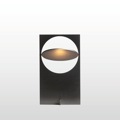 Modern wall light fixture with a black frame and circular design on a white background