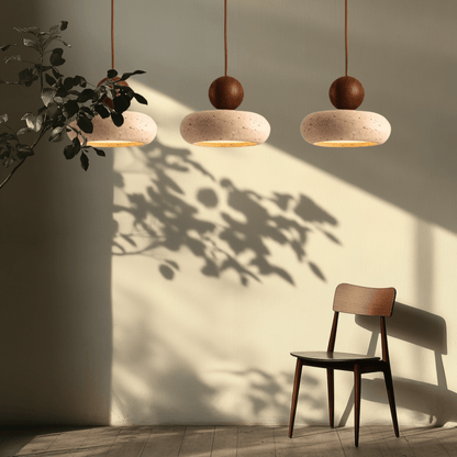 Sunlace Agate Pendant Lamp LED trio casting warm light in a minimalist room, highlighting the natural stone texture and organic design.
