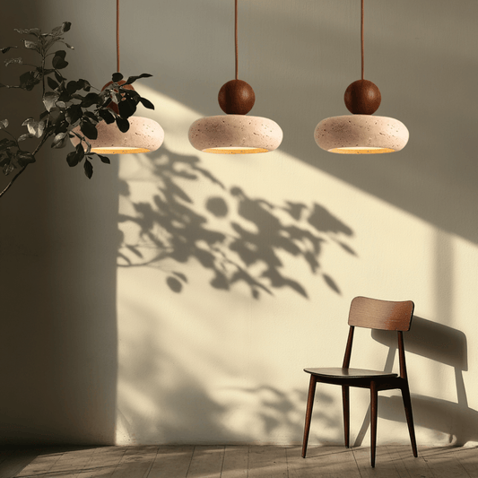 Sunlace Agate Pendant Lamp LED trio casting warm light in a minimalist room, highlighting the natural stone texture and organic design.
